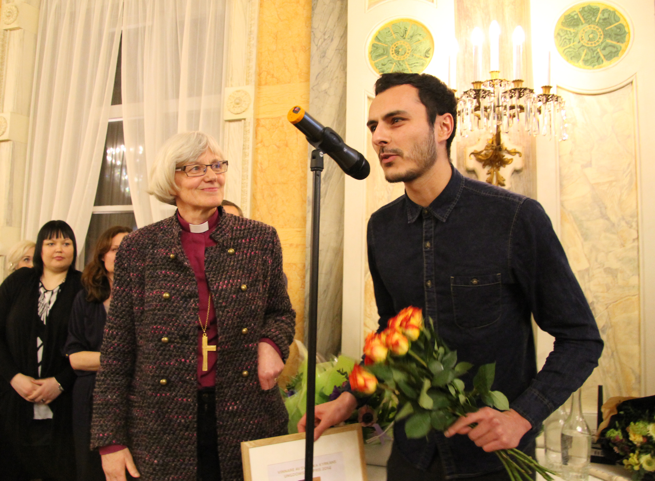 Bishop Antje Jackelen presenting Noof Ousellam with the award for Best Film at the BUFF Film Festival in Sweden. Photograph by Maria Lundström